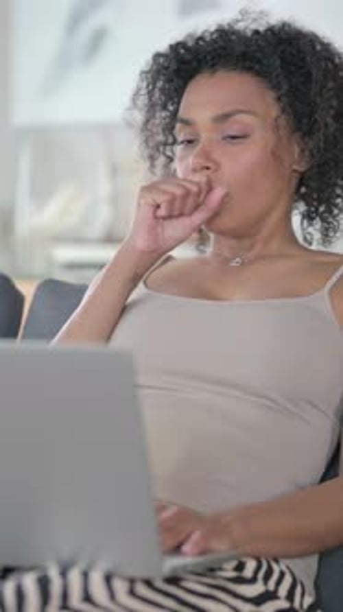 Woman Working from Home is Sick