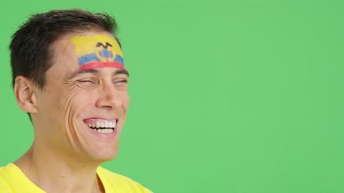 Smiling Man with Painted Flag on Forehead