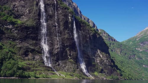 The Sven sisters waterfall - an iconic feature of the Geiranger fjord, Norway. Seven steams falling