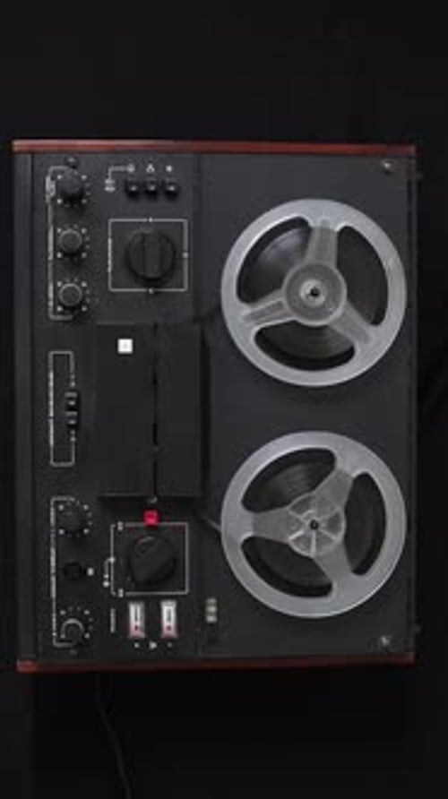 Vintage Reel to Reel Tape Recorder Playing Music Old Coil Tape Recorder with Magnetic Tape on Reels