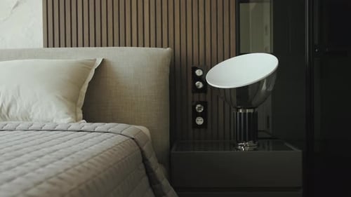 Closeup Luxury Bedroom with Modern Interior Double Bed with Pillows and Bedding Empty Bedside Table