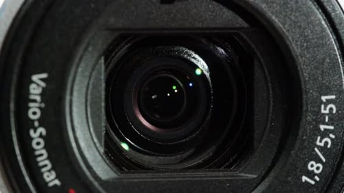 Closeup of Vintage Videocamera Close and Open Lens Zoom of Camera Using Portable Camcorder to