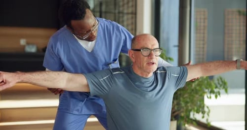 Physical therapy, nurse and old man in nursing home, stretching and arm exercise for rehabilitation