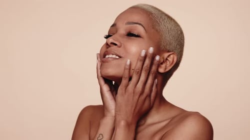 Woman Posing for Beauty Shoot in Studio
