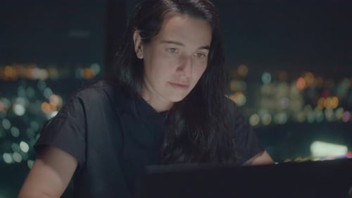 European woman working at night