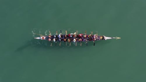 Dragon Boat team and onboard pace Drummer, Aerial view.