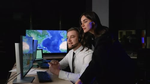 Transport Dispatchers Monitoring Cargo Delivery Trucks on a Global Map