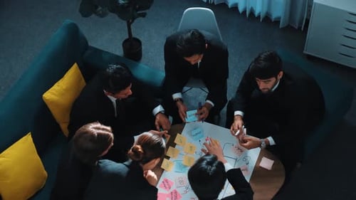Business Team Brainstorming Ideas Together in Modern Office