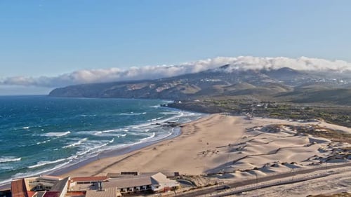Revealing drone footage of the beautiful beach at sunrise