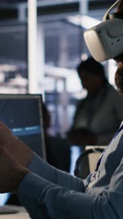 Vertical Video Data Center Employee Wearing VR Headset Using Artificial Intelligence