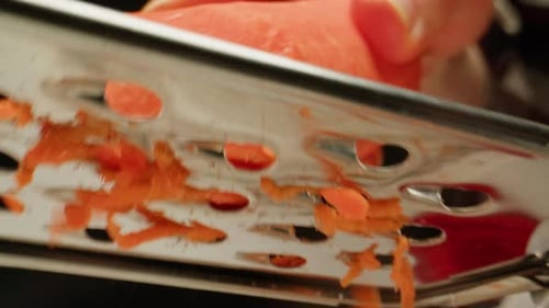 Carrot Macro Woman Hands with a Grater Grate Carrots on the Wooden Board Chef Cooking Polish Potato