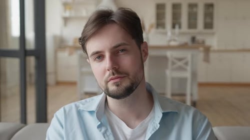 Portrait of a Smiling Young Adult Man Indoors
