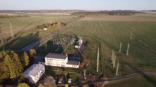 Drifting towards an electric substation near a rural field