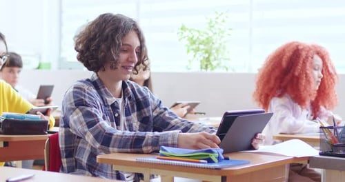 Students Using Tablets During Modern Class Time