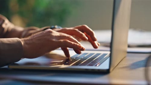 Unknown Writer Typing Keyboard Modern Laptop at Table Close Up. Man Hands