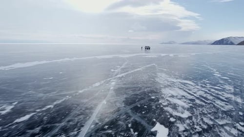 Car on Ice on Lake Baikal Drone Flying