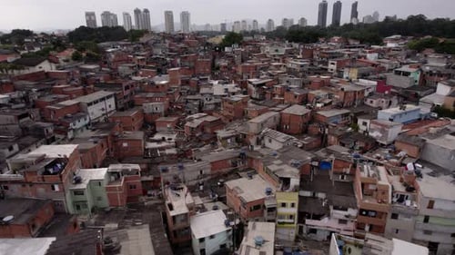 Aerial view over ramshackle houses and streets, poverty in Sao Paulo, Brazil