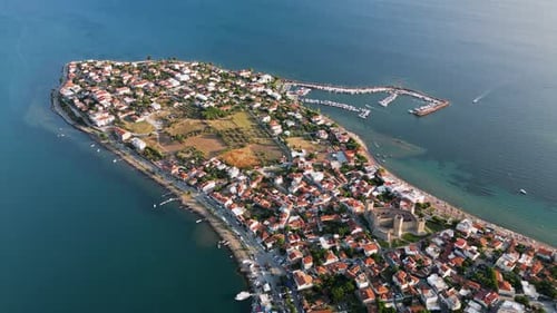 Drone view of the sea and houses on the Çandarlı coastline
