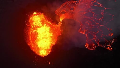 Volcano Erupts in Iceland Red Hot Lava Bursts Out of the Ground Crater of an Active Volcano