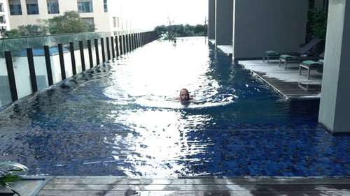 Young Man Swimming in Pool, Super 240
