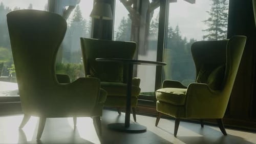 Armchairs Around Table in Bright, Comfortable Interior