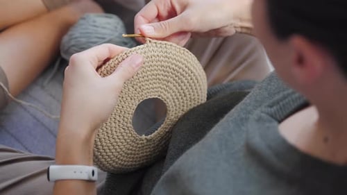 Woman Doing Circular Crochet Work With Yarn