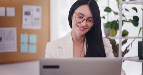 Happy Woman Working on Laptop Smiling Portrait