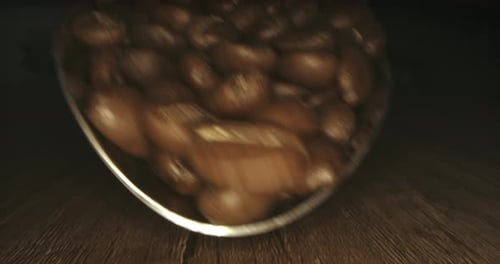 Close Up of Coffee Beans Being Poured