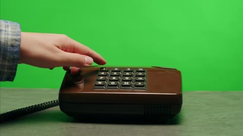 Retro Vintage Phone on Chroma Key Green Screen Rotary Telephone is Displayed on a Wooden Desk Adding