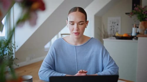 Woman Using Laptop Inside Home During Daytime