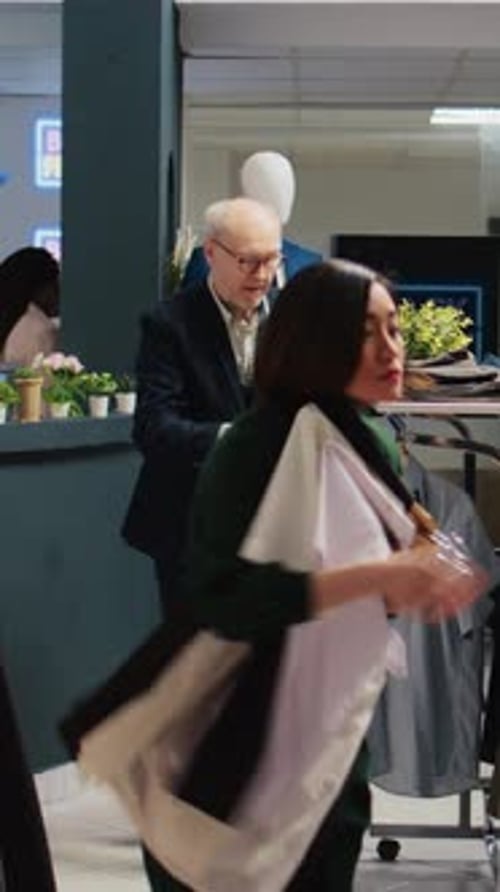 Shoppers Rummaging Through a Department Store on Black Friday