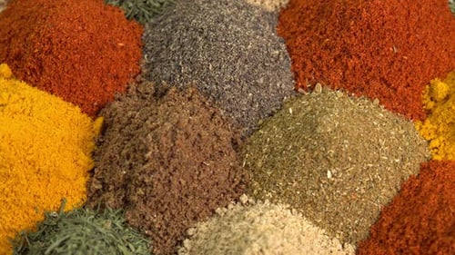 Spice and seasoning. Various fragrant spice market. Heap different Asian Spices rotated on wooden