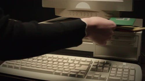 Using Diskette FDD for Old Computer Closeup Hand Inserting and Ejecting Floppy Disk Into Vintage PC