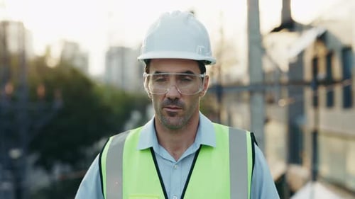 Portrait of Engineer on Construction Site Looking at Camera