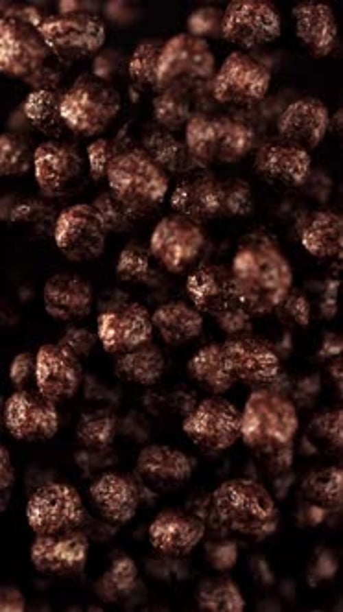 Chocolate Corn Balls Fly Up and Down Filmed on a Highspeed Camera at 1000 Fps