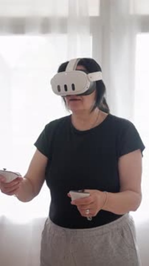 Woman Using VR Headset in Bright Living Room