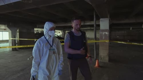 Detective and Forensic Experts Examining Crime Scene in Garage