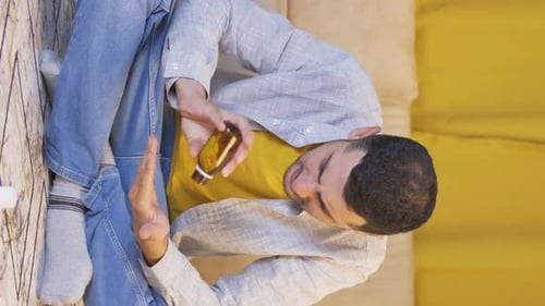 Young Adult Pours Pills Into Hand