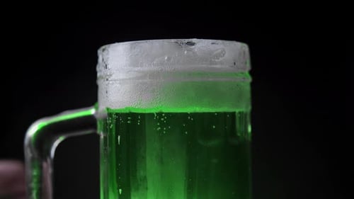 Close up of an Oversized Mug of Green Beer