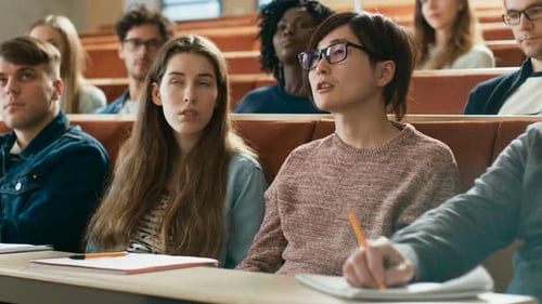 Students Listening Attentively in University Lecture Hall