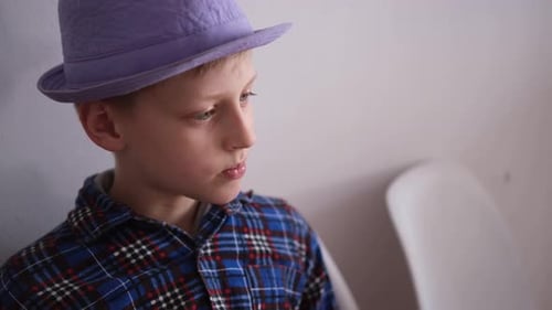 Boy in a Hat Close Up Portrait