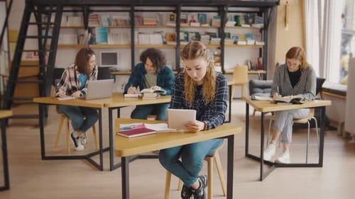 Students Studying Together in Library