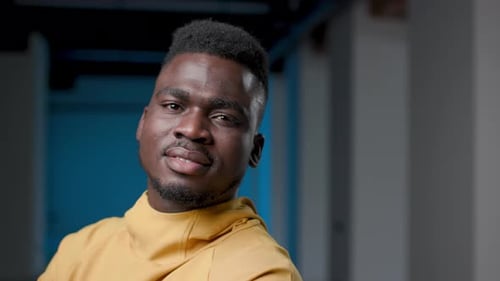 Youthful Nice Bearded African Man Smiling Friendly Portrait Close Up Front View