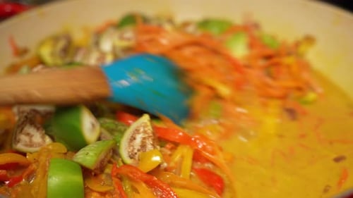 Colorful Vegetables Cooking in a Yellow Sauce
