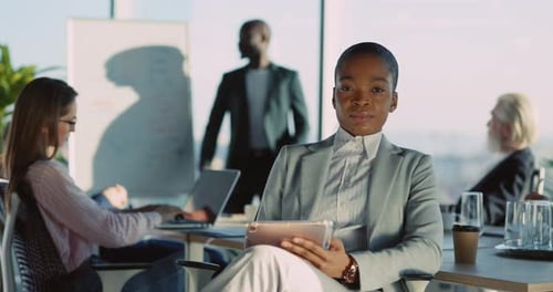 Business Meeting with Diverse Group in Modern Office