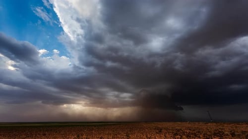 Dramatic Storm Clouds Rolling Over Rural Farmland