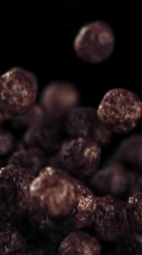 Chocolate Corn Balls Fly Up and Down Filmed on a Highspeed Camera at 1000 Fps
