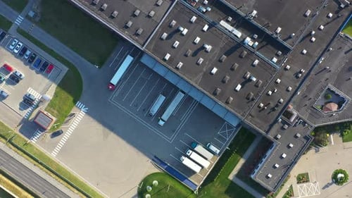 An aerial shot of the Golden Arches of McDonalds. Close to highway