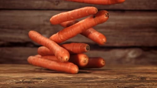 Falling Carrots on the tableFilmed is Slow Motion 1000 Fps