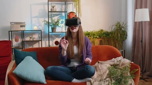 Woman Experiencing Virtual Reality with Headset at Home